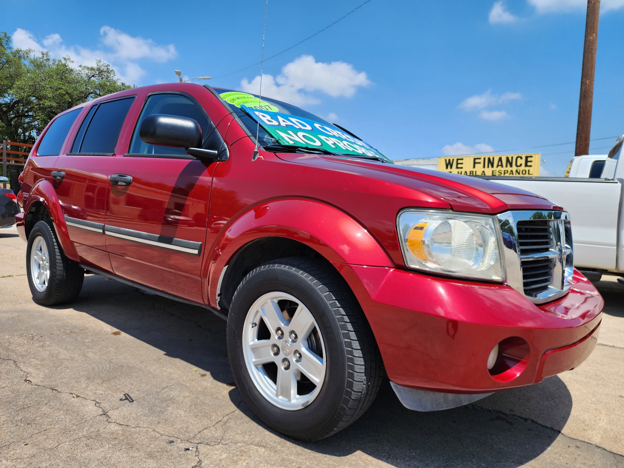 2007 RED /GRAY Dodge Durango SLT (1D8HD48P47F) with an 4.7L V8 SOHC 16V FFV engine, AUTO transmission, located at 2660 S.Garland Avenue, Garland, TX, 75041, (469) 298-3118, 32.885387, -96.656776 - Welcome to DallasAutos4Less, one of the Premier BUY HERE PAY HERE Dealers in the North Dallas Area. We specialize in financing to people with NO CREDIT or BAD CREDIT. We need proof of income, proof of residence, and a ID. Come buy your new car from us today!! This is a 2007 Dodge Durango SLT V8 S - Photo #1